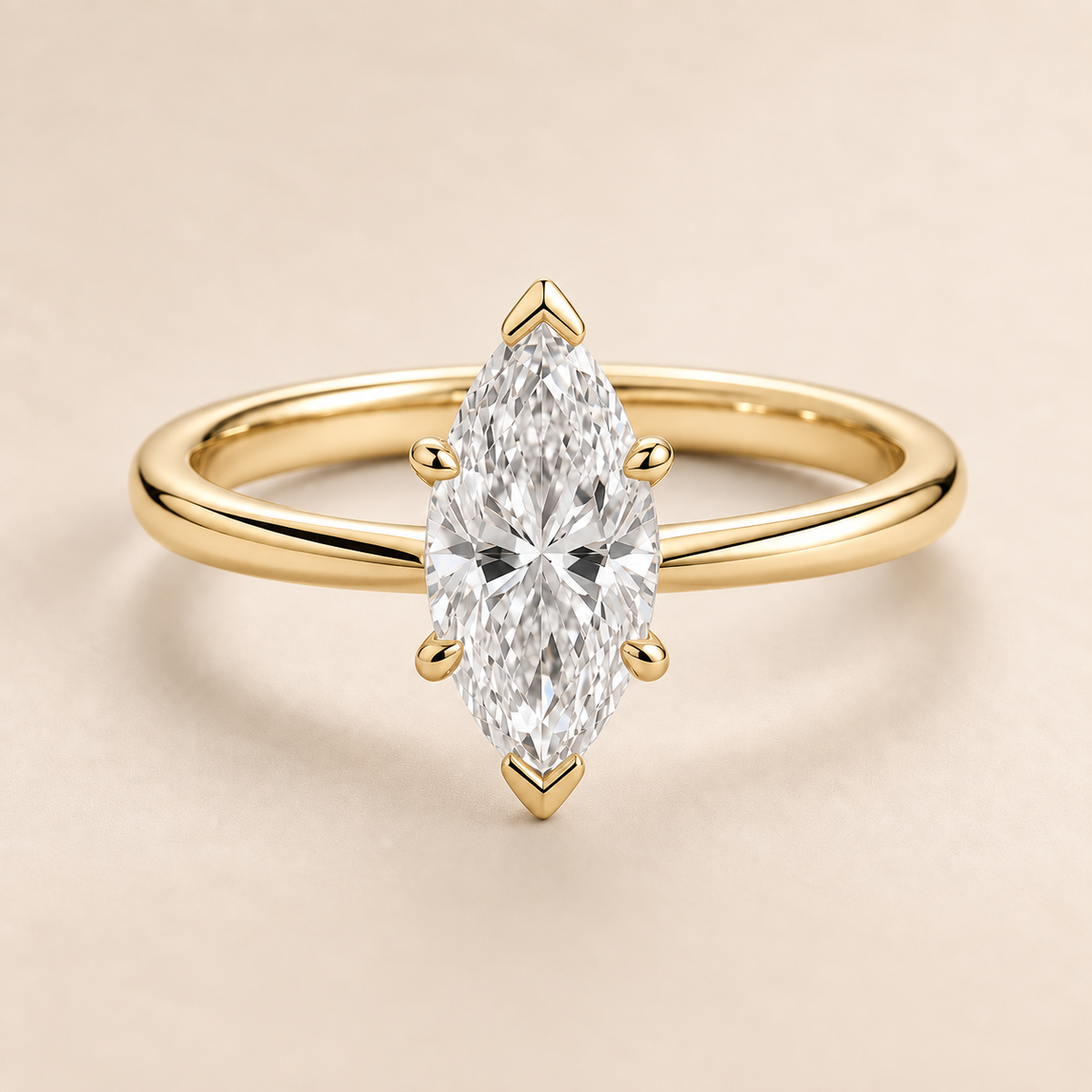 Marquise solitaire engagement ring in Yellow Gold — front view