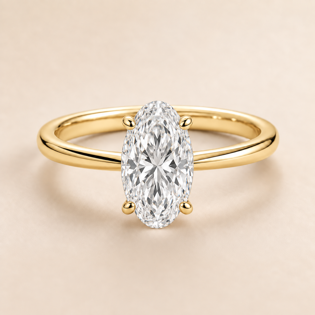 Moval solitaire engagement ring in Yellow Gold — front view