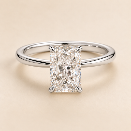 Radiant solitaire engagement ring with Pear-reference plain band in white gold, front view