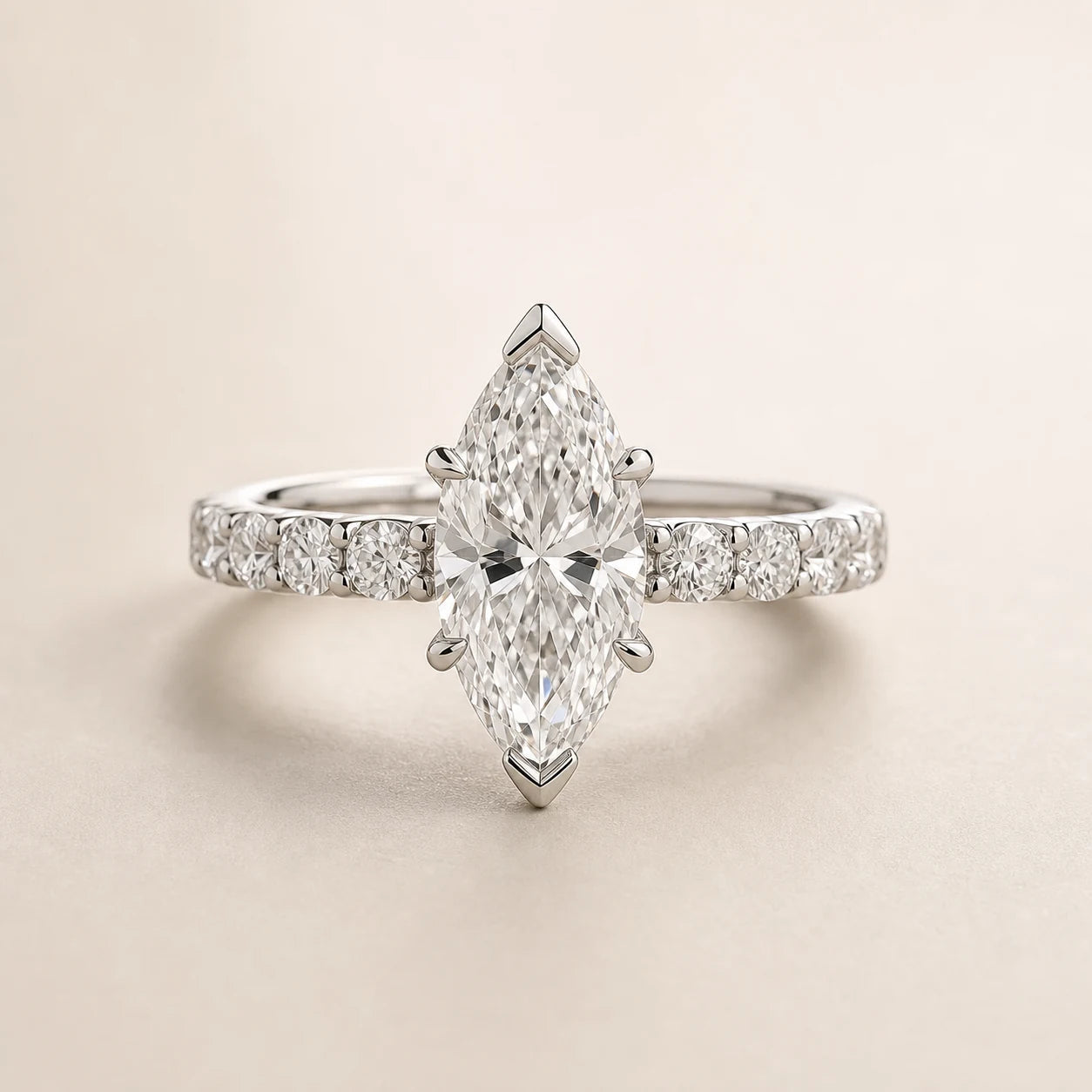 Marquise lab-grown diamond engagement ring with protective tip prongs and a white-gold diamond band