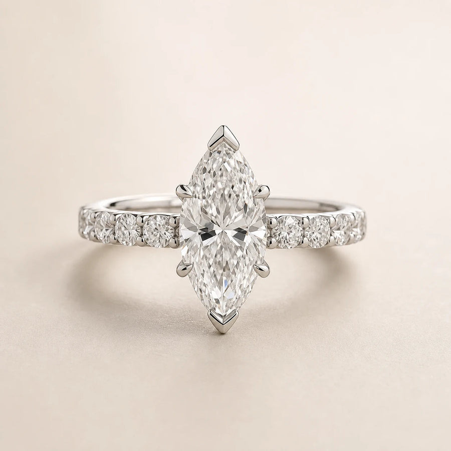 Marquise lab-grown diamond engagement ring with protective tip prongs and a white-gold diamond band