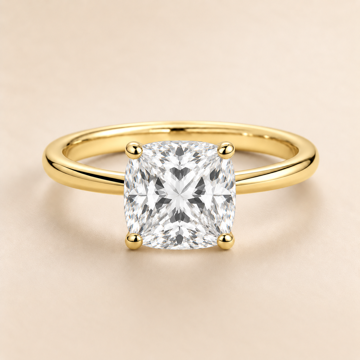 Cushion solitaire engagement ring in Yellow Gold — front view
