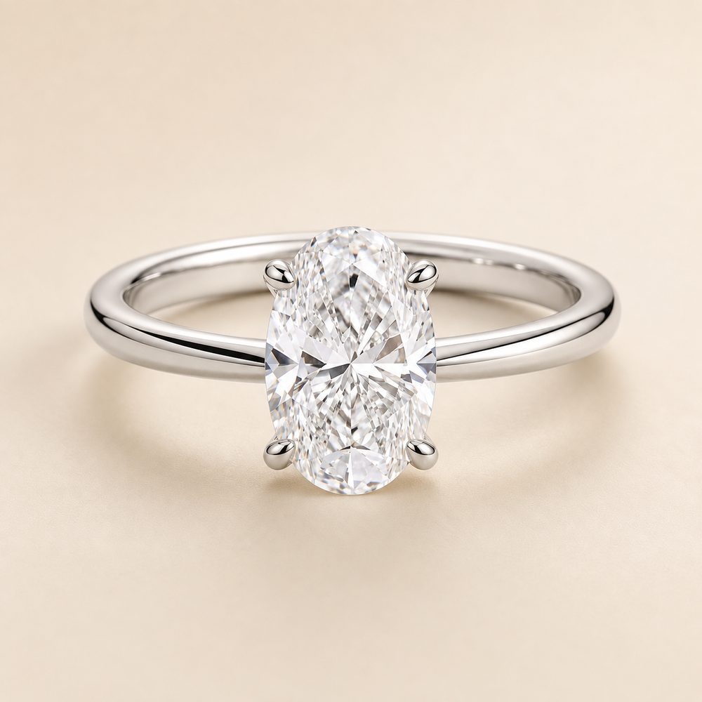Oval solitaire engagement ring in White Gold — front view