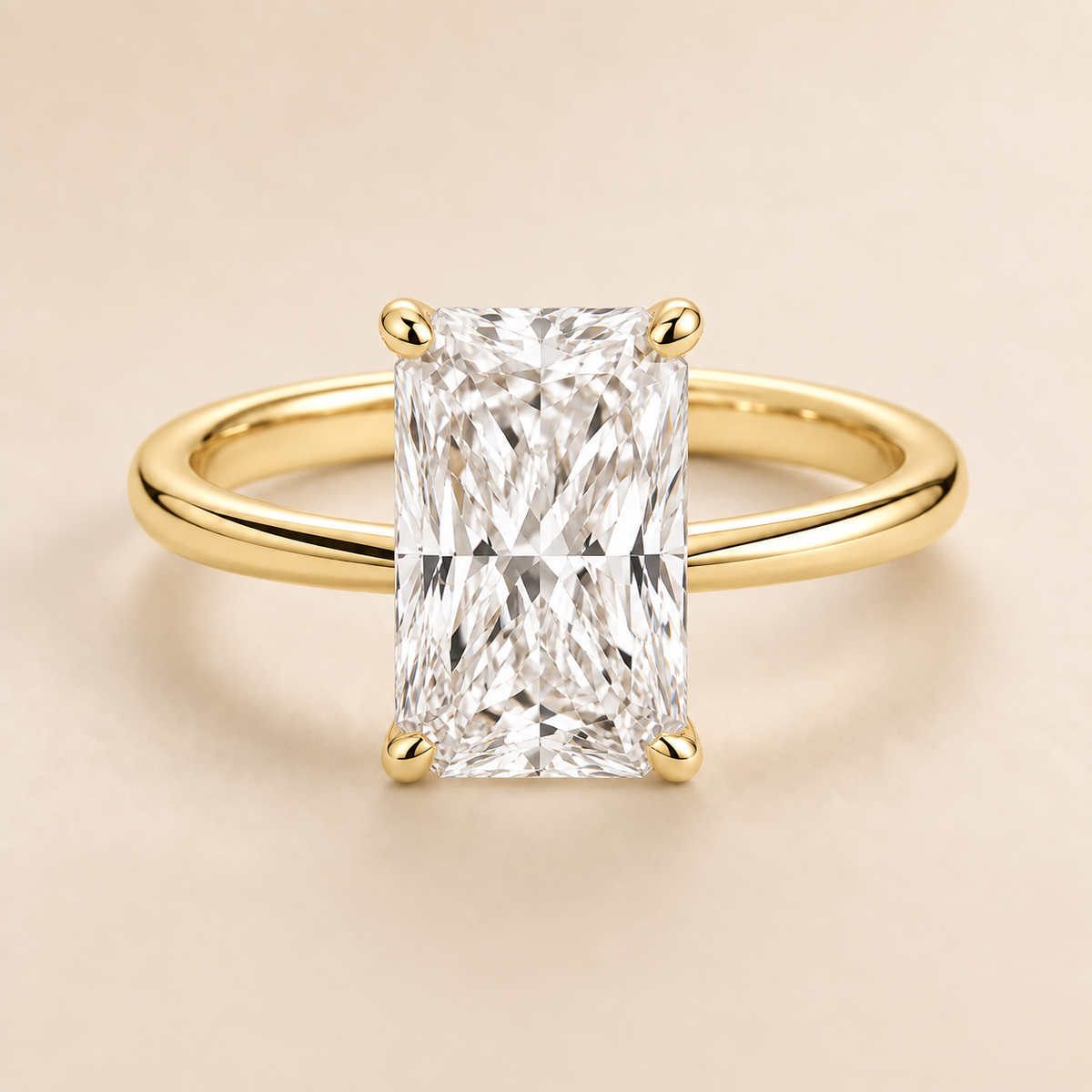 Radiant solitaire engagement ring in Yellow Gold — front view